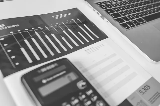 calculator, numbers, accounting, charts, graphs, finance, macbook, laptop, computer, technology, gray computer, gray technology, gray laptop, gray finance, gray numbers, gray accounting, accounting, accounting, accounting, accounting, accounting, finance. Before you trust an ecommerce SEO dashboard, check these measurement mistakes